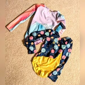 2 girls gymnastics leotards